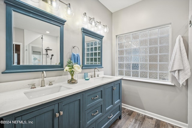 bathroom featuring vanity and wood-type flooring