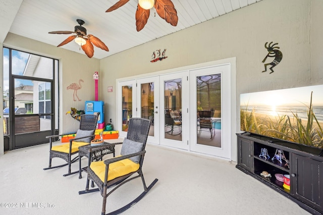 sunroom with french doors and ceiling fan