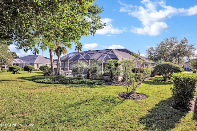 view of yard with a lanai