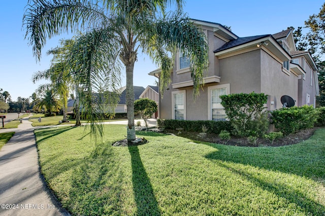 exterior space featuring a yard