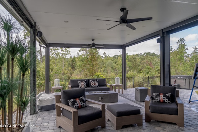 95 Caribbean Pl, Saint Johns, FL 32259 - view of patio / terrace with a view of trees, a ceiling fan, and an outdoor living space with a fire pit