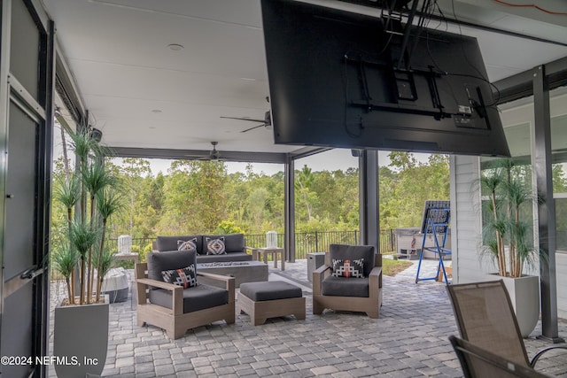 view of patio / terrace featuring ceiling fan and an outdoor hangout area