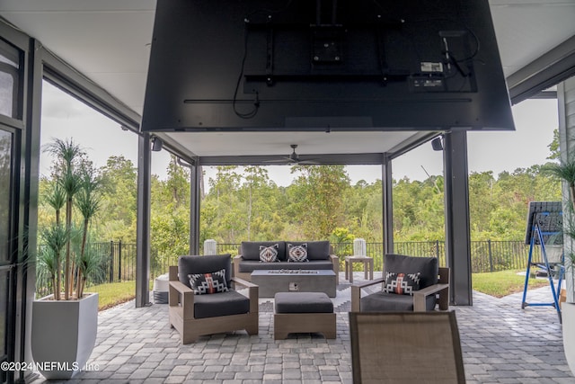 view of patio / terrace featuring an outdoor living space and ceiling fan