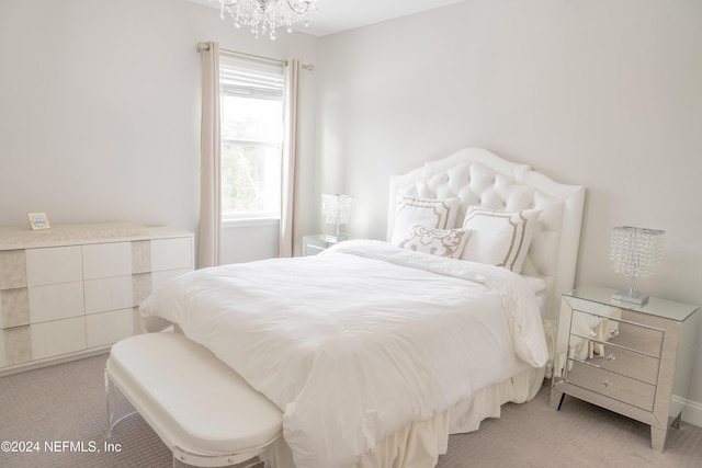 95 Caribbean Pl, Saint Johns, FL 32259 - bedroom with a notable chandelier and light colored carpet