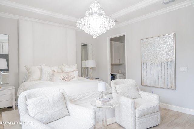 bedroom with ornamental molding and light hardwood / wood-style floors