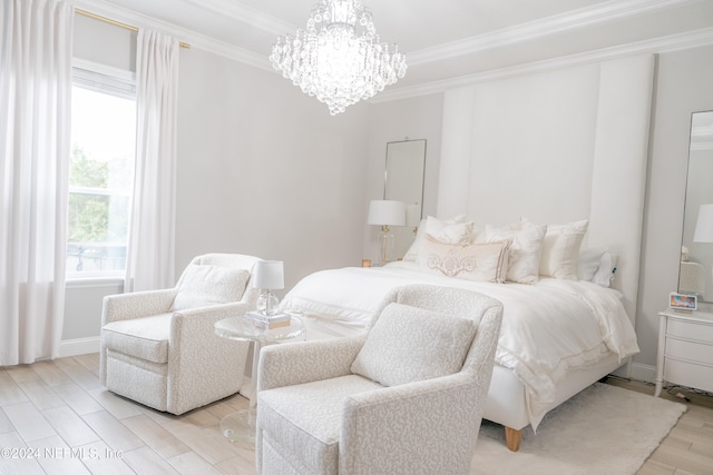 bedroom with light hardwood / wood-style floors, multiple windows, an inviting chandelier, and crown molding