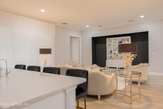 95 Caribbean Pl, Saint Johns, FL 32259 - living area with visible vents, ornamental molding, baseboards, recessed lighting, and light wood finished floors