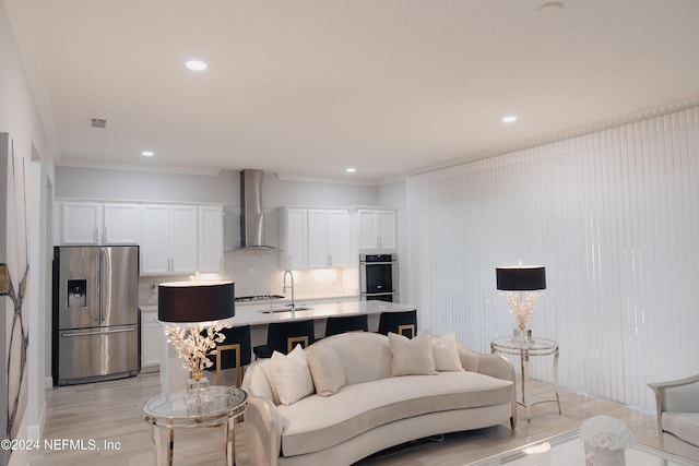 95 Caribbean Pl, Saint Johns, FL 32259 - living area featuring light wood-type flooring, ornamental molding, visible vents, and recessed lighting