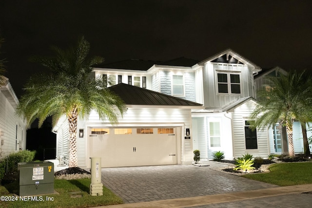 view of front of house with a garage