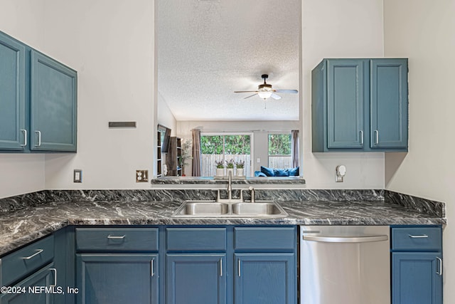 kitchen with sink, stainless steel dishwasher, blue cabinetry, a textured ceiling, and ceiling fan