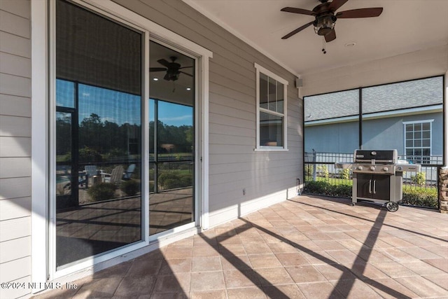 view of patio / terrace with ceiling fan and grilling area