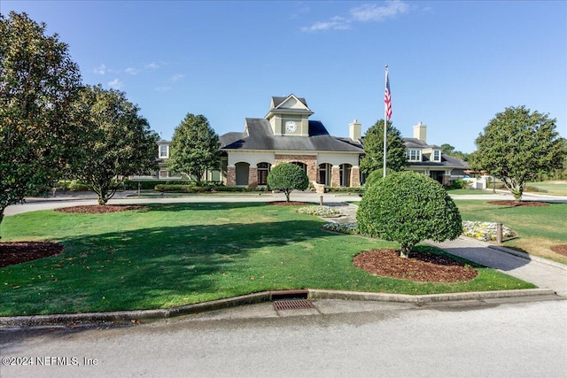 view of front of home with a front lawn