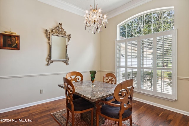 dining room with crown molding, a chandelier, and dark wood-type flooring