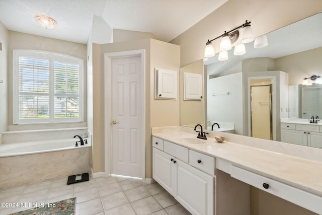 bathroom featuring lofted ceiling, tile patterned flooring, vanity, shower with separate bathtub, and a textured ceiling