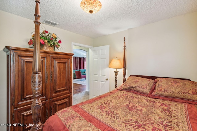 bedroom with a textured ceiling