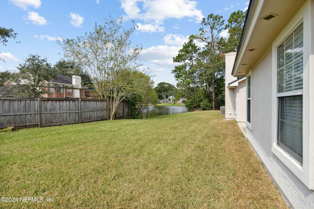 view of yard with a water view