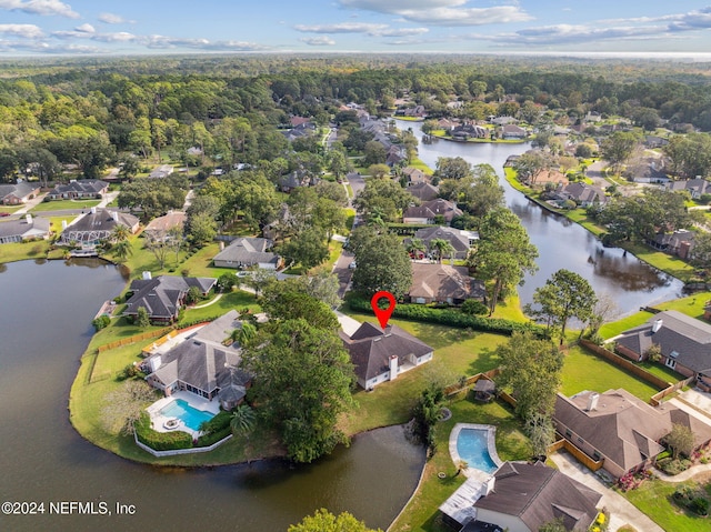 birds eye view of property featuring a water view