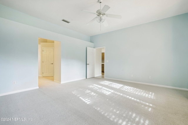 unfurnished bedroom featuring ceiling fan and light colored carpet