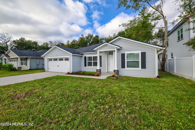 ranch-style home with a front lawn and a garage