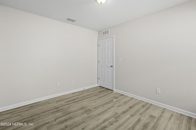 empty room featuring light hardwood / wood-style floors