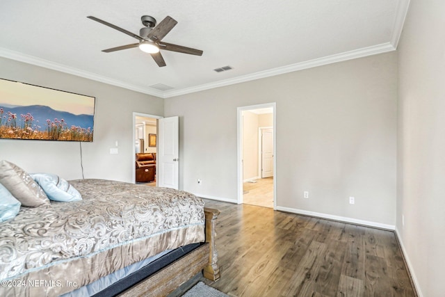 bedroom with ceiling fan, hardwood / wood-style flooring, and ornamental molding