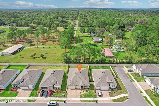 7558 Nasturtium Way, Jacksonville, FL 32219 - birds eye view of property featuring a residential view and a wooded view