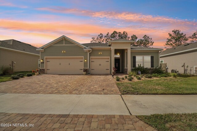 prairie-style home with a garage