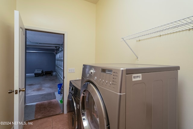 washroom featuring independent washer and dryer and tile patterned floors