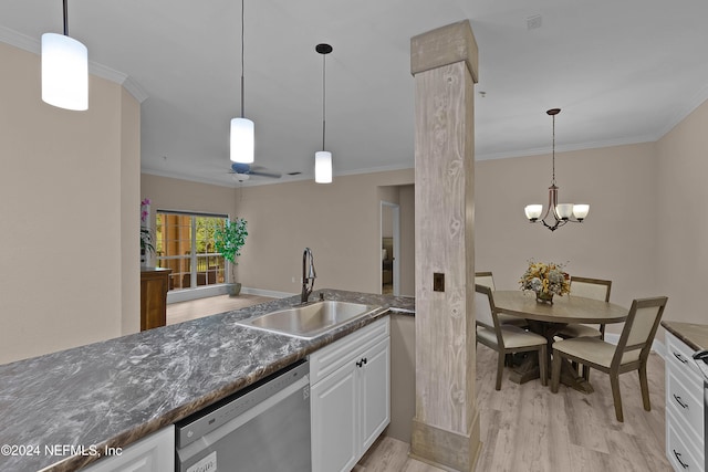 kitchen with white cabinetry, pendant lighting, sink, and stainless steel dishwasher