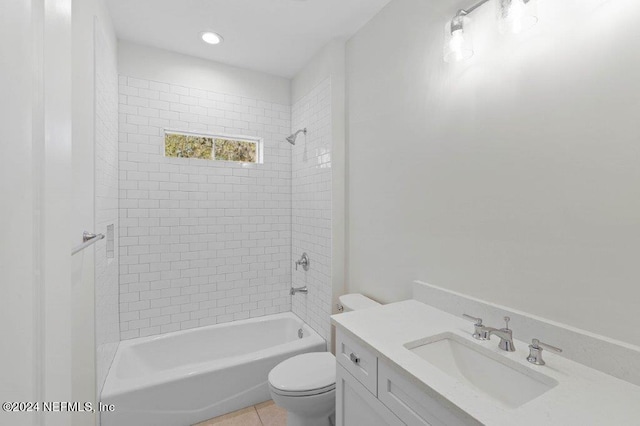 96613 Bay View Dr, Fernandina Beach, FL 32034 - bathroom featuring toilet, vanity, washtub / shower combination, tile patterned floors, and recessed lighting