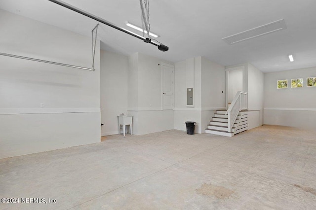 96613 Bay View Dr, Fernandina Beach, FL 32034 - garage featuring electric panel and a garage door opener