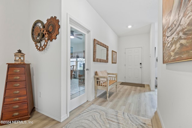 hallway with light wood-type flooring