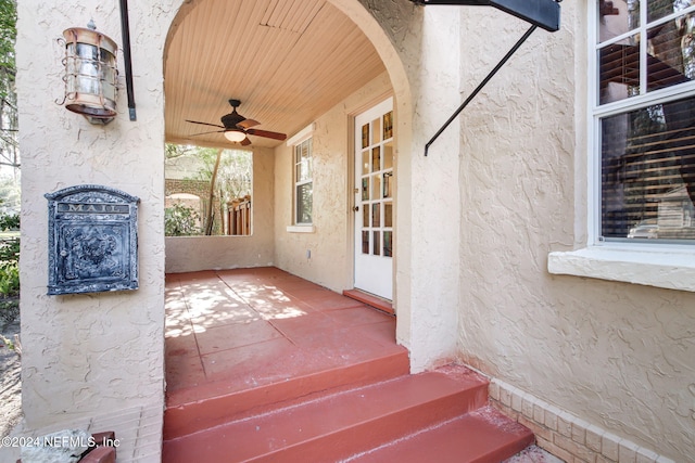 view of patio / terrace featuring ceiling fan