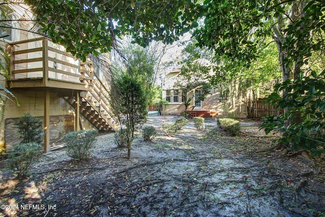 view of yard featuring a deck