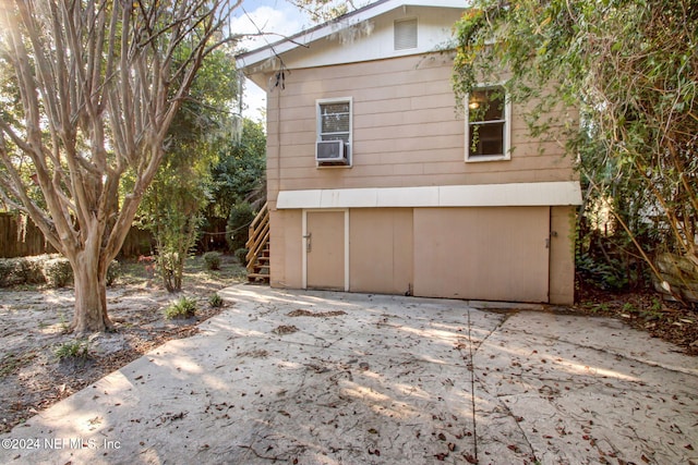 view of property exterior featuring a patio