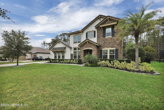 view of front facade featuring a front yard