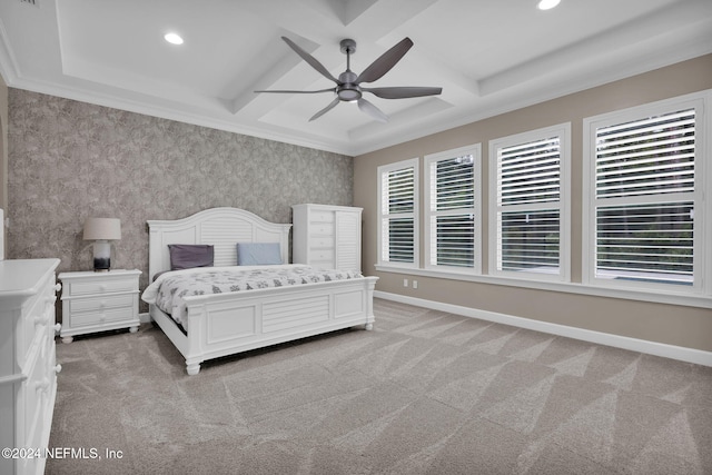 bedroom with beamed ceiling, ceiling fan, crown molding, and carpet floors