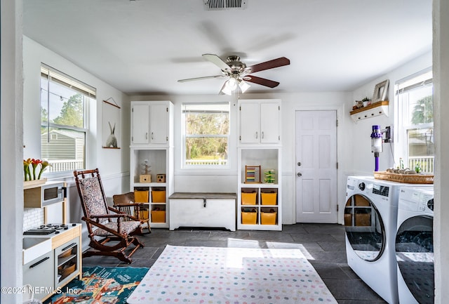 laundry area featuring washer and dryer and ceiling fan