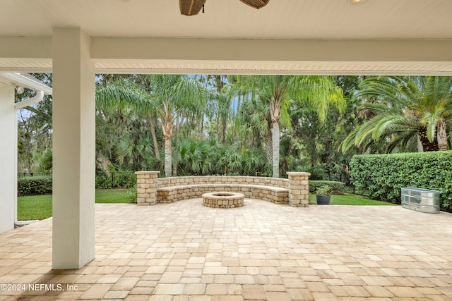 view of patio / terrace with an outdoor fire pit