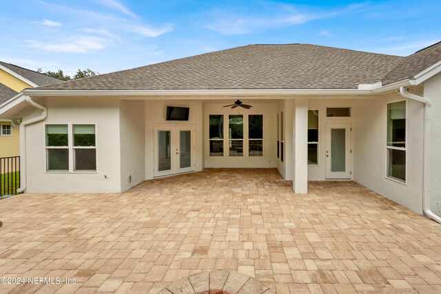 back of property featuring ceiling fan, french doors, and a patio area