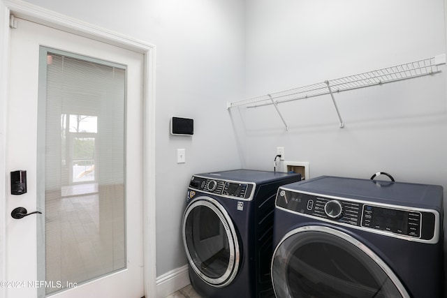 laundry area with washer and clothes dryer