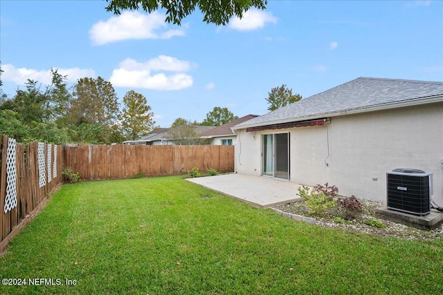 view of yard featuring a patio and cooling unit