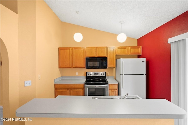 kitchen featuring black microwave, freestanding refrigerator, stainless steel electric stove, lofted ceiling, and pendant lighting