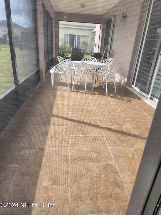 view of unfurnished sunroom