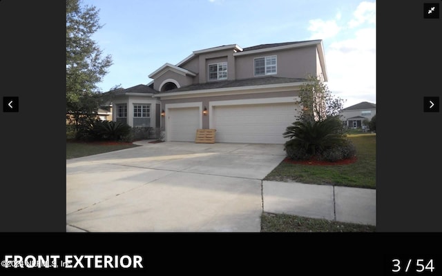 view of front property with a garage