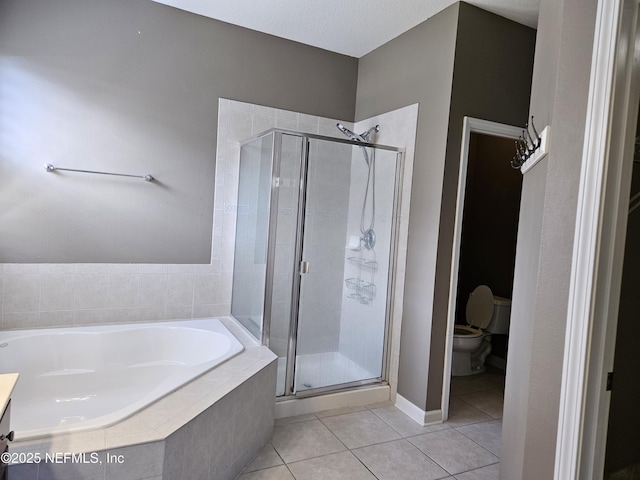 full bath featuring toilet, a stall shower, tile patterned flooring, and a bath