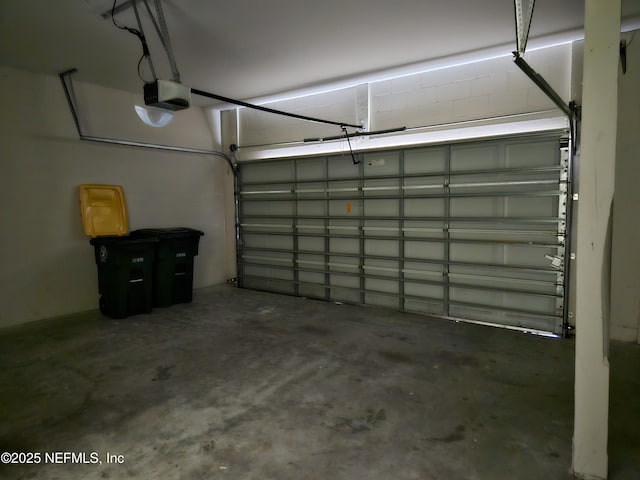 garage featuring a garage door opener