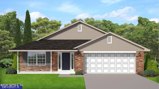 view of front of house with a front yard and a garage