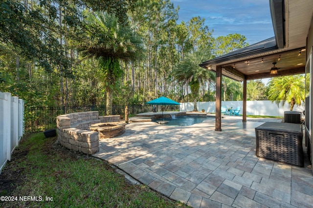 view of patio / terrace featuring a fenced in pool and cooling unit