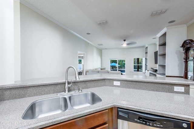 kitchen with crown molding, dishwasher, and sink